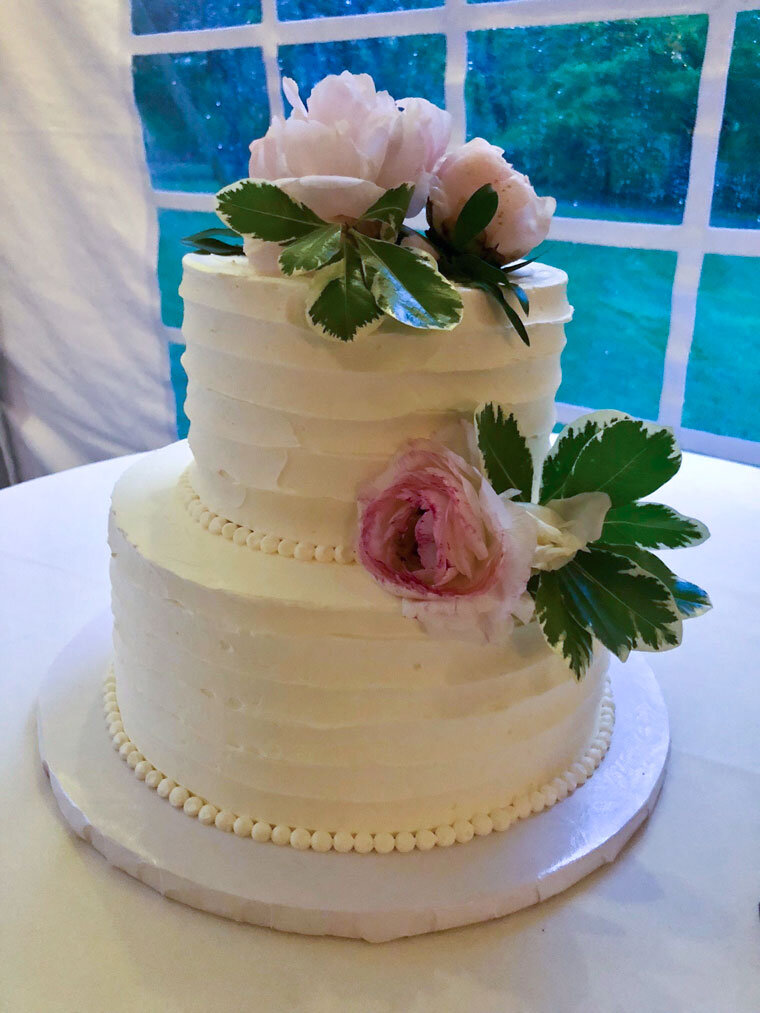 beautiful classic stacked cake with buttercream frosting