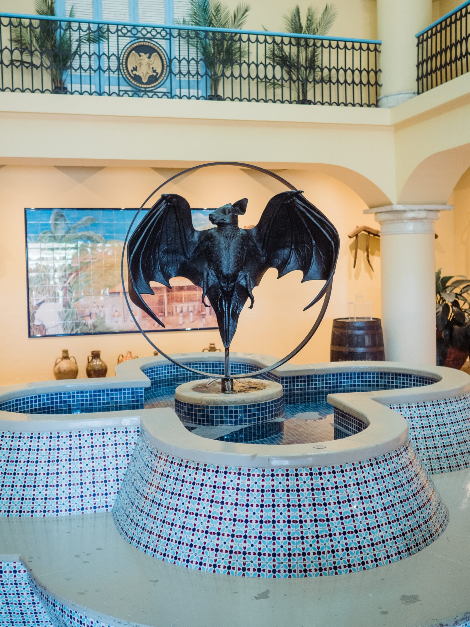 Inside Casa Bacardi with rum bat in a water fountain