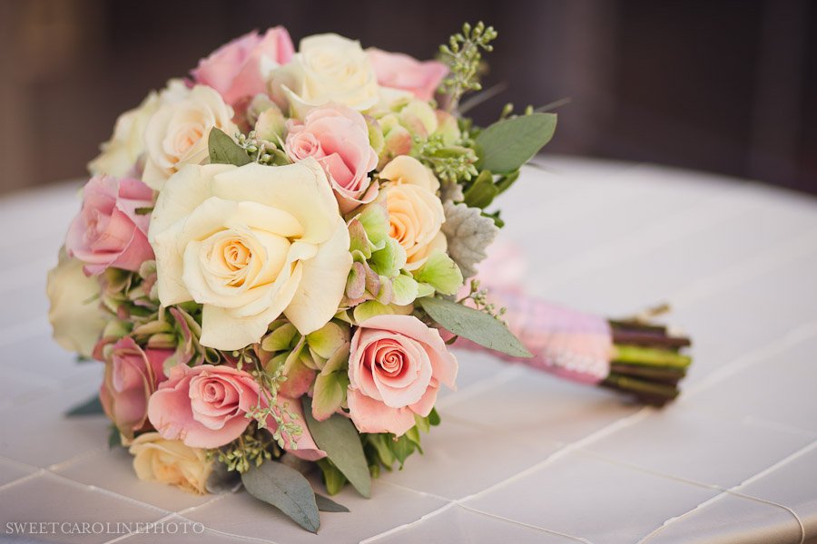 pink and white roses with green hydranga bouquet