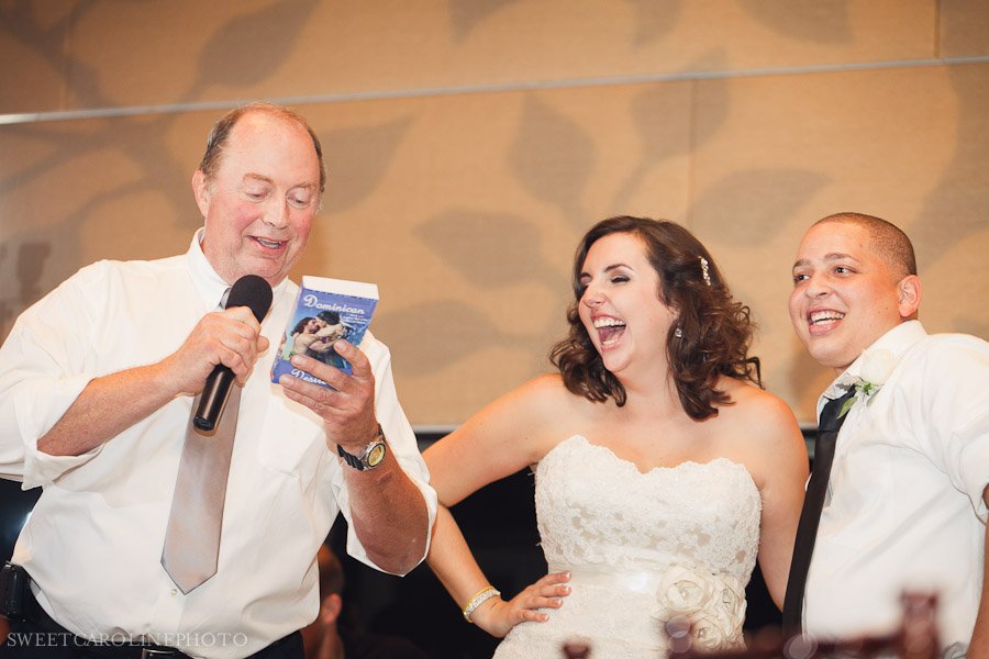father of bride reading back of 'Dominican Desires' novel