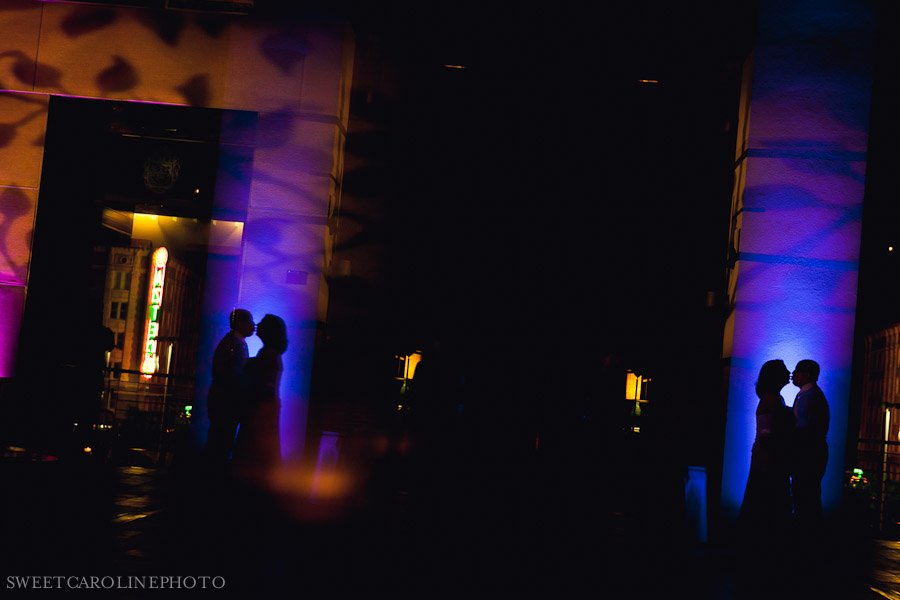 bride and groom silhouette with blue light at night