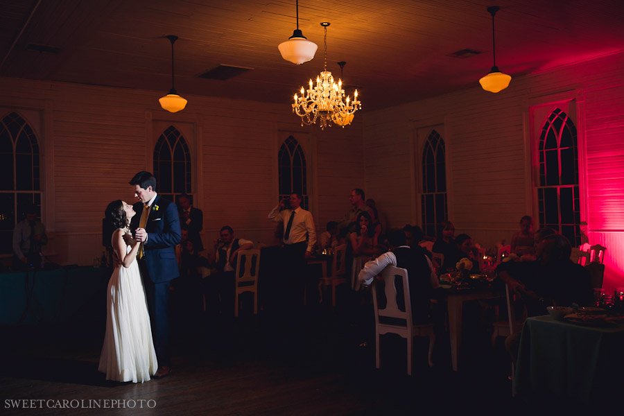 first dance in mercury hall with pink uplighting