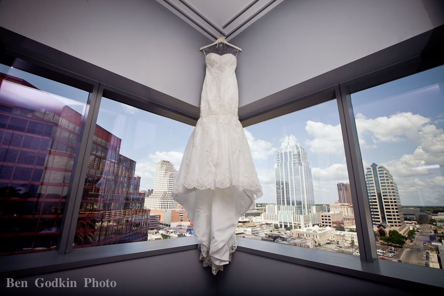 Wedding dress hanging in the window at the W hotel in downtown Austin