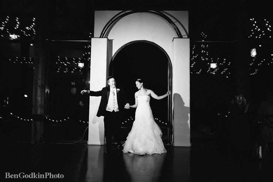 bride and groom make their entrance into the barn  reception at the barr mansion