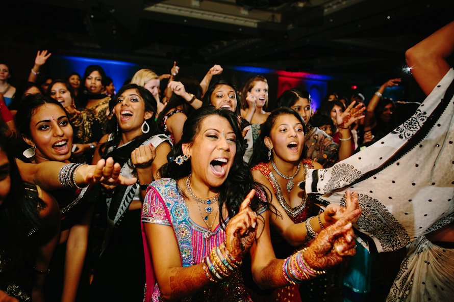 Indian bride dancing at reception