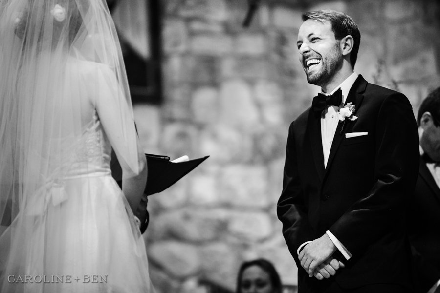 groom laughing during the ceremony