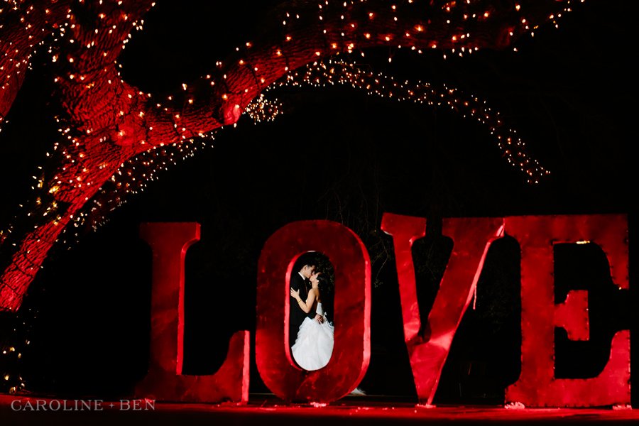 night photo LOVE sign bride groom Antebellum Oaks
