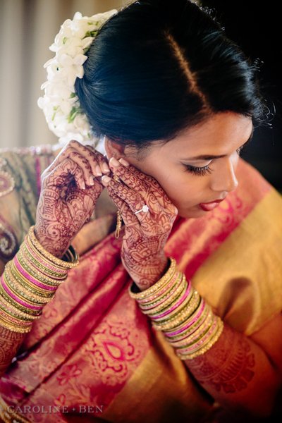indian bride getting ready mehndi