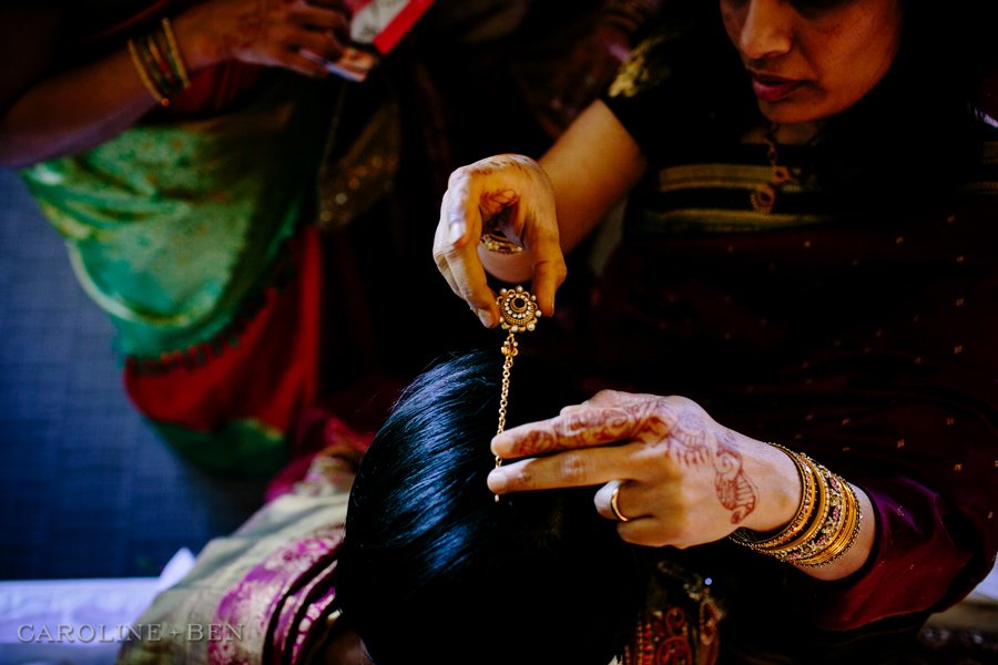 indian bride getting ready for ceremony