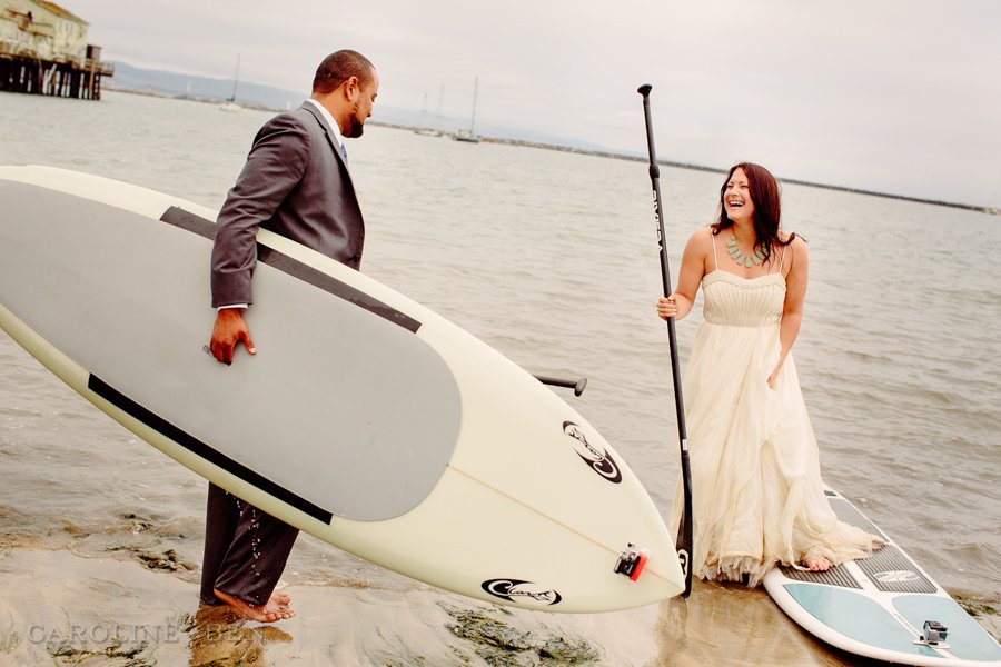 Half Moon bay session with the bride and groom on paddle boards