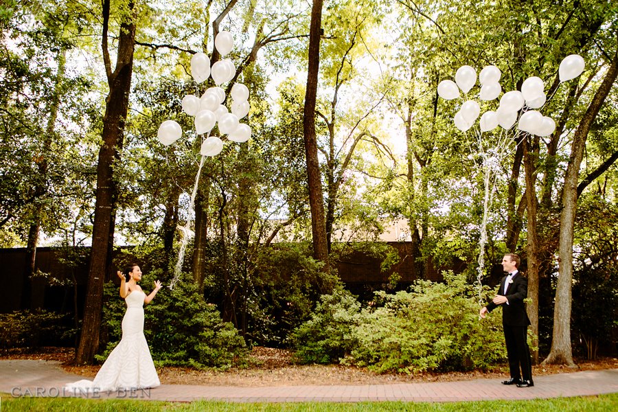 bride and groom first look with balloons