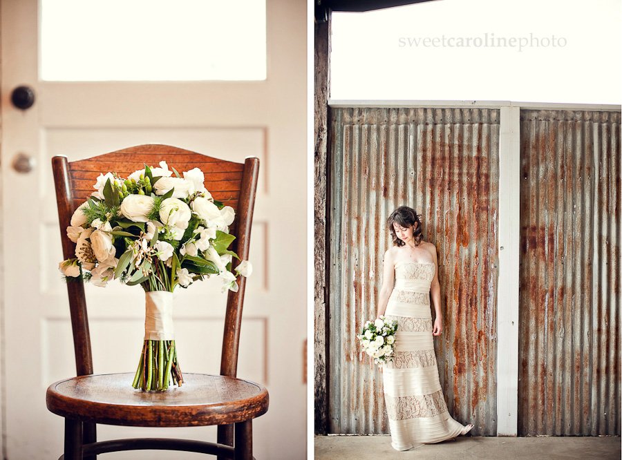 bride against rustic wall with gorgeous flowers