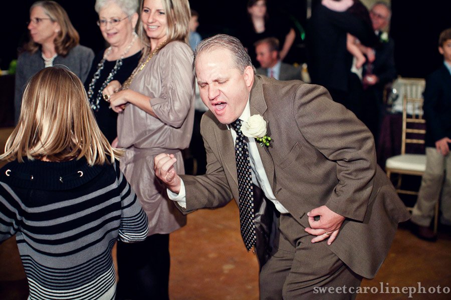 guest playing air guitar at Houston wedding