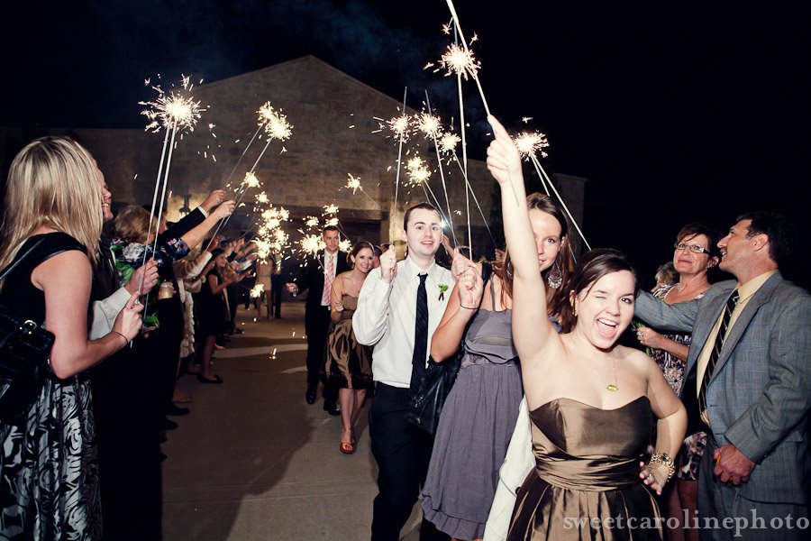 bridal party exiting with sparklers