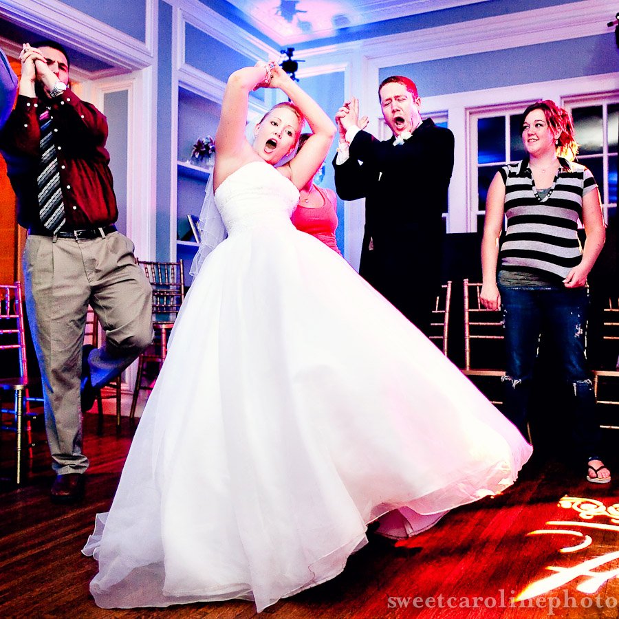 bride doing the Aggie war hymn at Astin mansion in College Stage