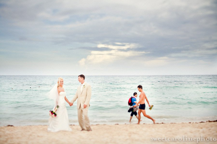 bride and groom on beach in Playa Del Carmen