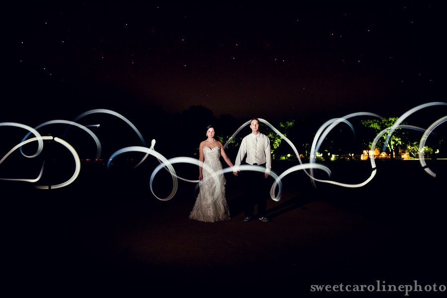 bride and groom under stars lighting at Houston Oaks Country Club