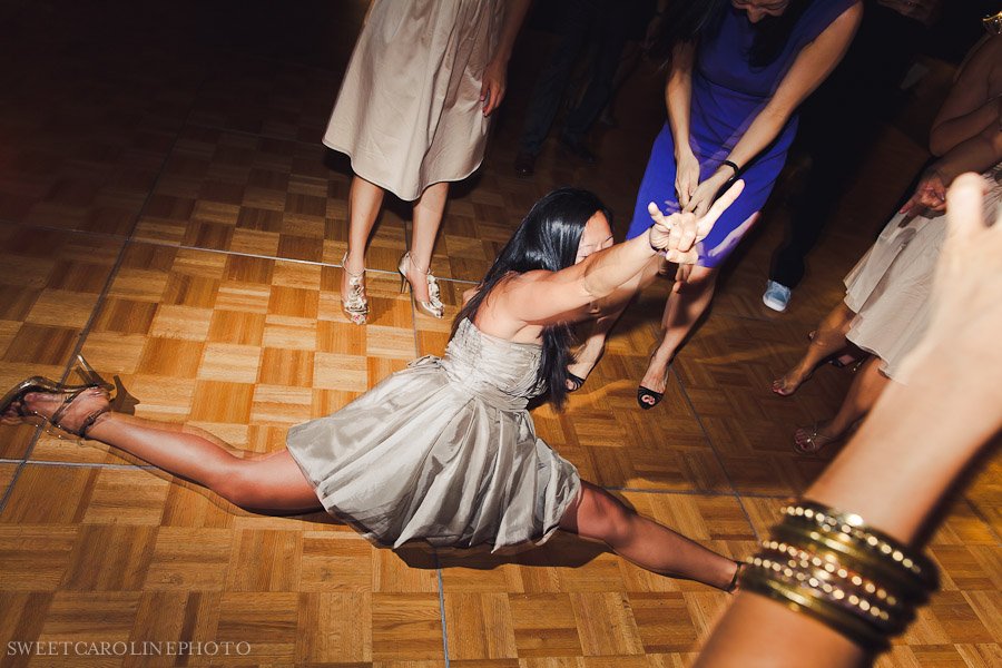 guest doing splits at wedding reception