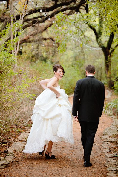 bride and groom walking down the gravel path