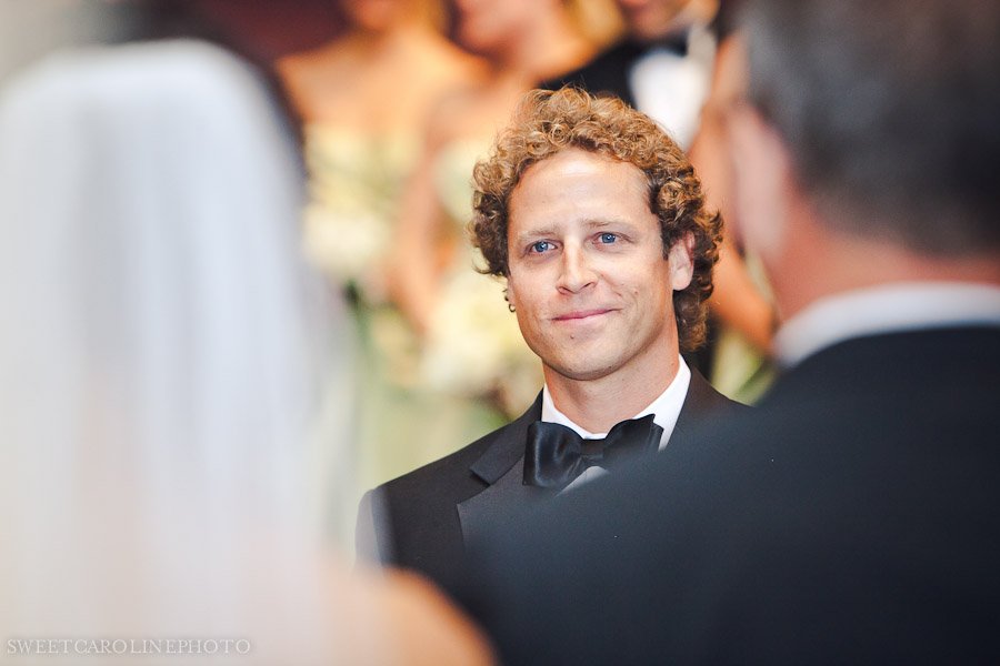 groom seeing bride for first time down aisle