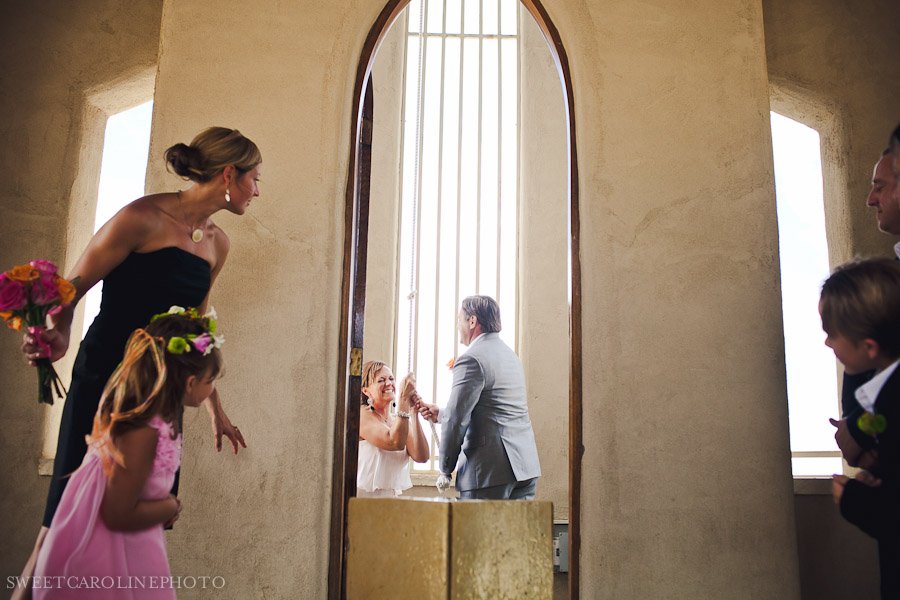 bride and groom ringing bell at Chapel Ducinea