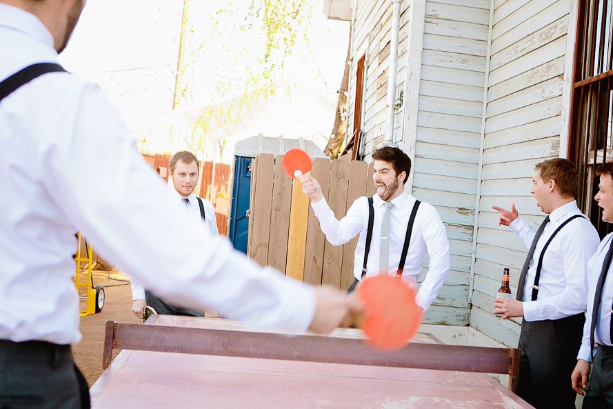 groom playing ping pong
