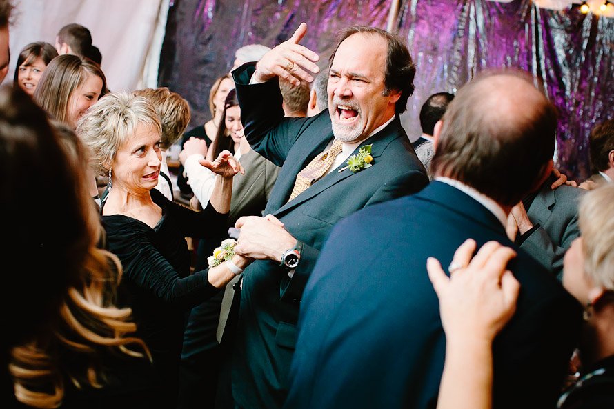 mother and father of groom dancing