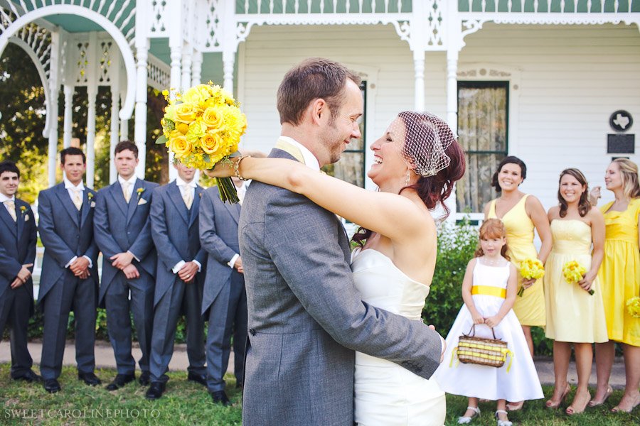 bride and groom with yellow bridal party
