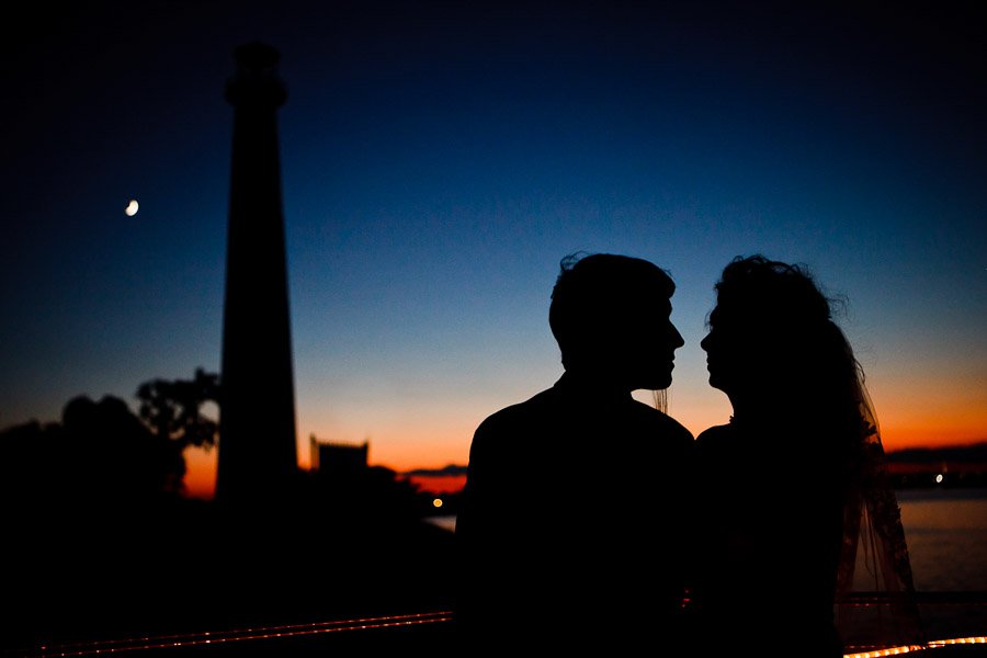 silhouette of bride and groom at sunset on the Spirit of Texas in Galveston