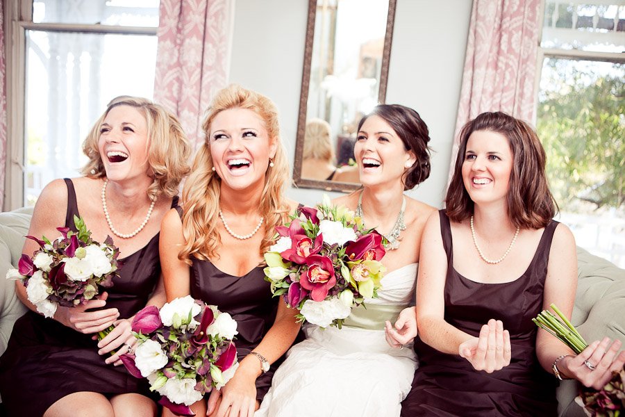 Bride and her girls laughing before the wedding at the Barr Mansion
