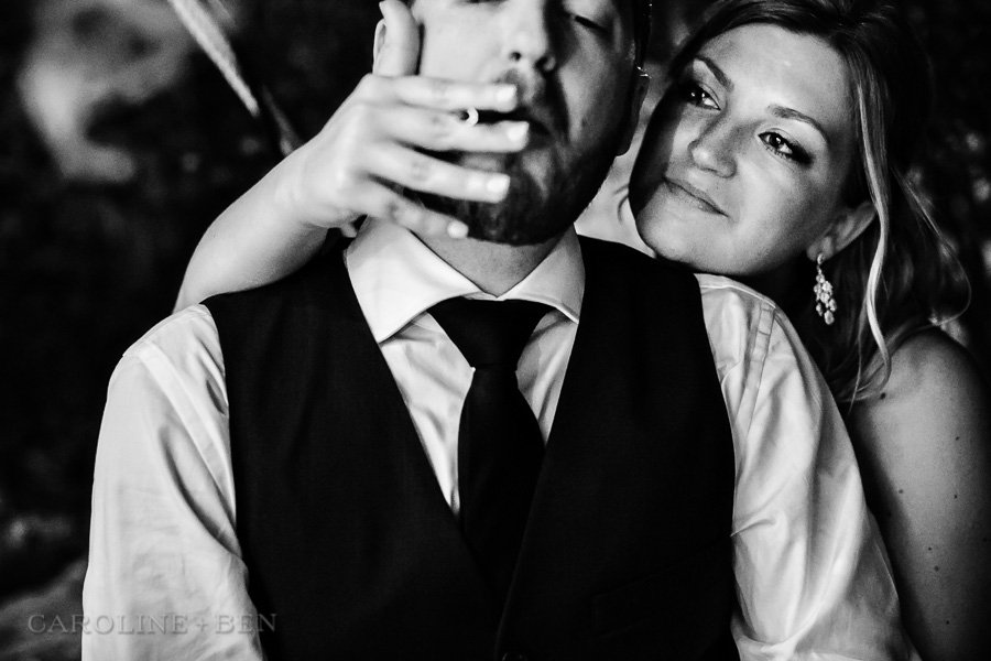 bride groom smoking cigar in cigar lounge