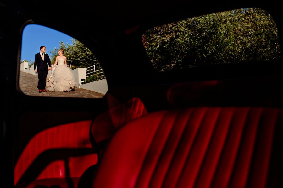 bride and groom with Italian fiat