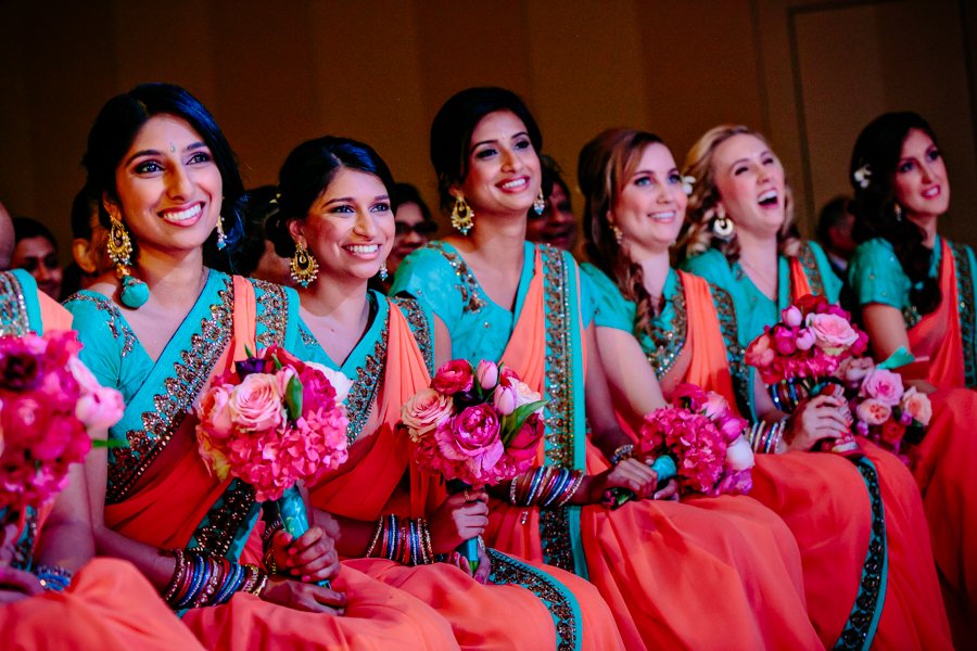 indian bridesmaid saris in turquoise and coral