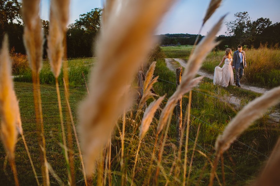 pecan springs wedding portraits in field
