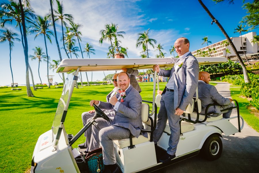 groom and groomsmen on golfcart