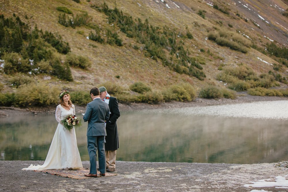 wedding ceremony on emerald lake at sunrise
