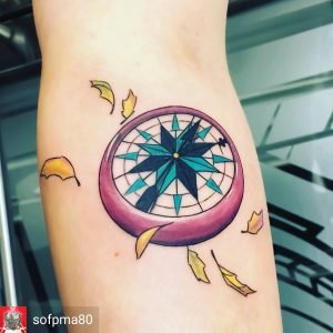 Colorful compass tattoo by Sof PMA at Paper Crane Studio