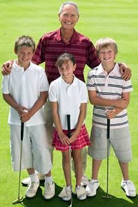 Man with grandchildren on golf course. © 2010 Jupiter Images All rights reserved.