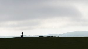 editors-letter-silhouetted-golfer-staff