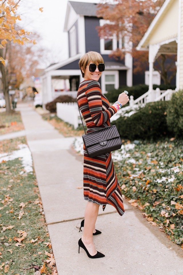 The Anthropologie Wish List by popular Indianapolis life and style blog, Seersucker and Saddles: image of a woman outside wearing a Anthropologie Parkside Knit Dress.
