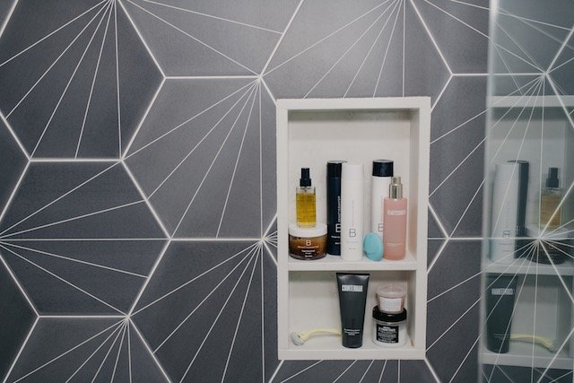 Clean Beauty Movement by popular Indianapolis beauty blog, Seersucker and Saddles: image of a shower shelf with Beautycounter products on it. 