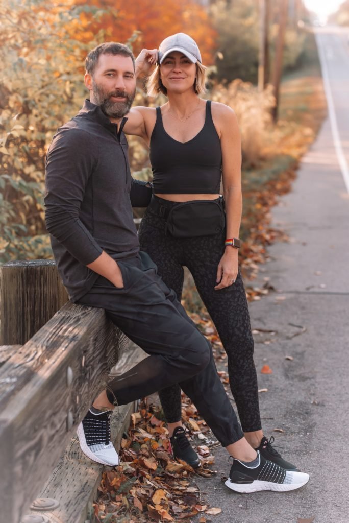 Athletic Apparel by popular Indianapolis fashion blog, Seersucker and Saddles: image of Beth Chappo and her husband standing next to each other outside and wearing Lululemon athletic apparel. 