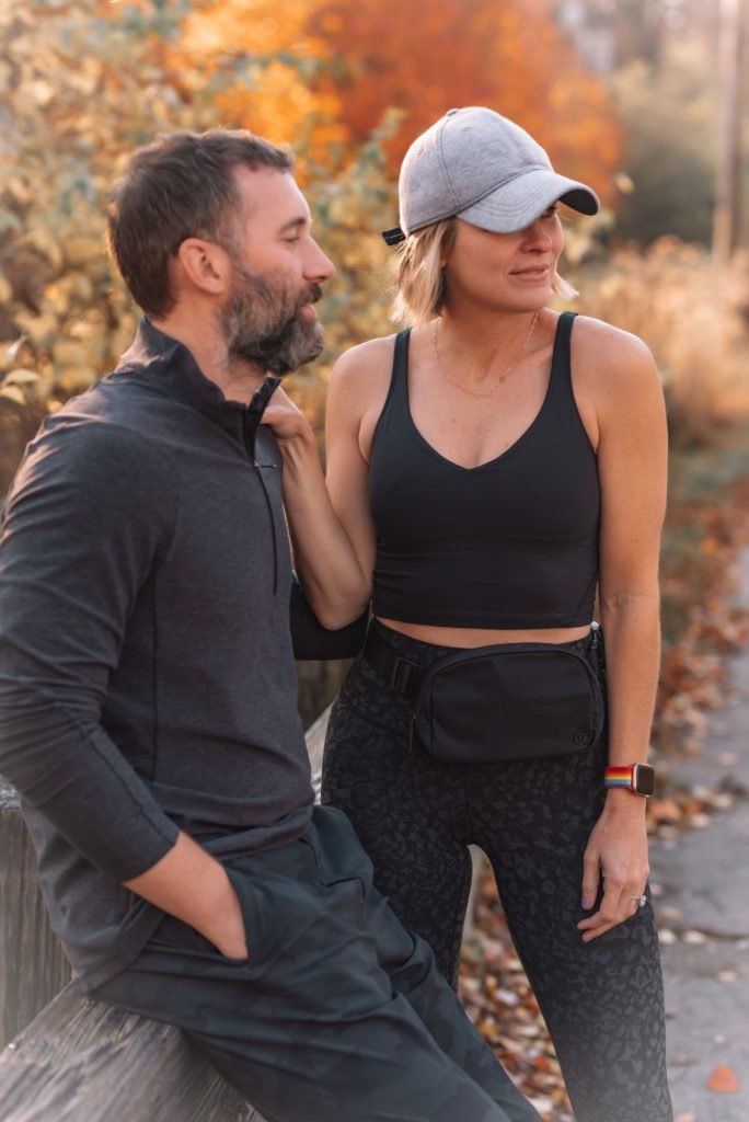 Athletic Apparel by popular Indianapolis fashion blog, Seersucker and Saddles: image of Beth Chappo and her husband standing next to each other outside and wearing Lululemon athletic apparel. 