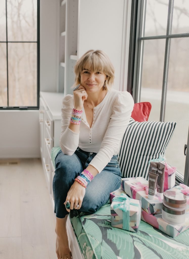Colleen Rothschild by popular Indianapolis beauty blog, Seersucker and Saddles: image of Beth Chappo sitting next to Colleen Rothschild products. 