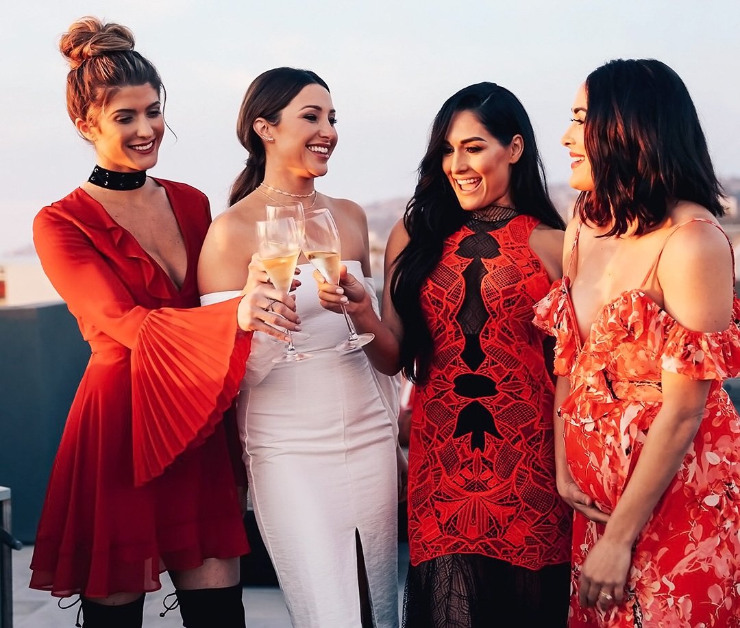 Four girlfriends cheers champagne on Galentine's Day