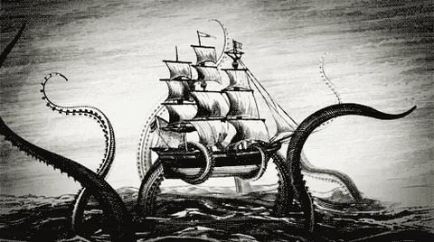 A huge tenatacled monster breaks a sailing ship in half.