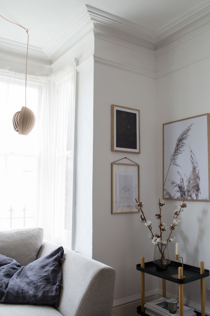 White and grey Scandinavian living room with botanical art and the 6 things I've learnt about slow decorating