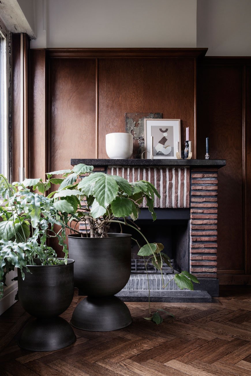 Giant black metal planters feature in the Ferm Living 2019 catalogue.