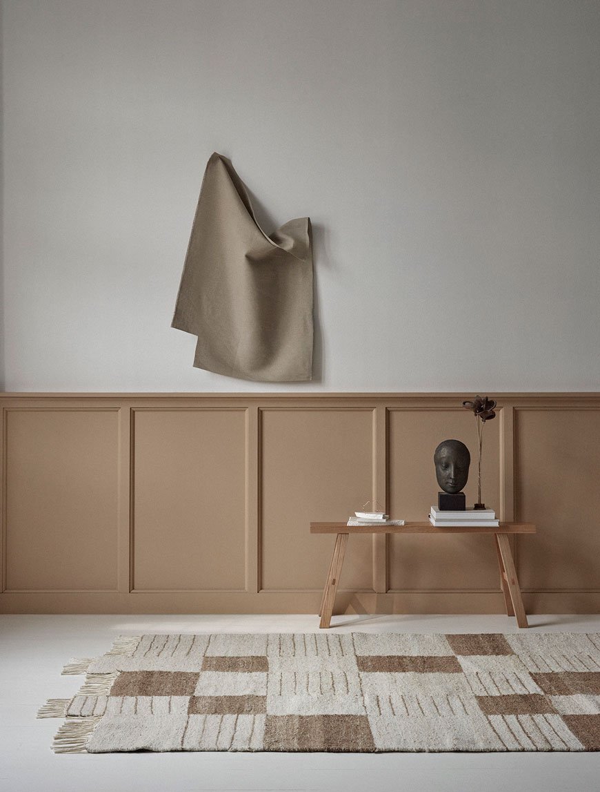 Brown and natural white flat woven rug, designed by Anna Pirkola for Sera Helsinki. 