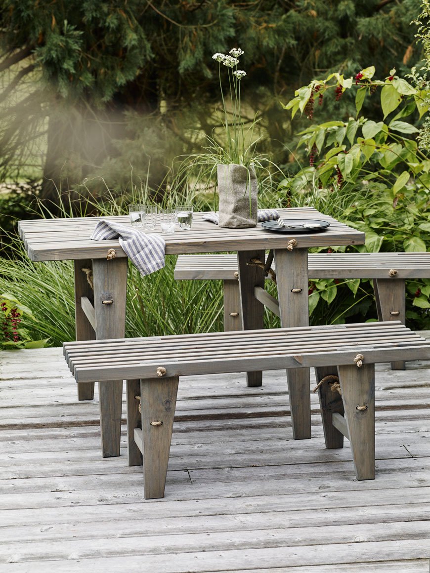 Coastal styled wooden slatted outdoor furniture with rope details by Rowen & Wren.
